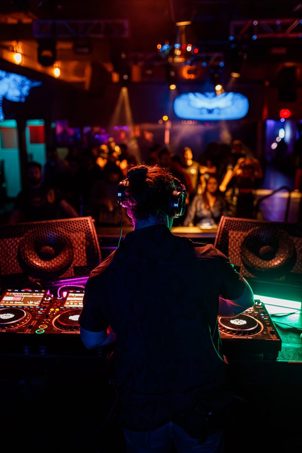 black label radio — behind the booth, facing the floor