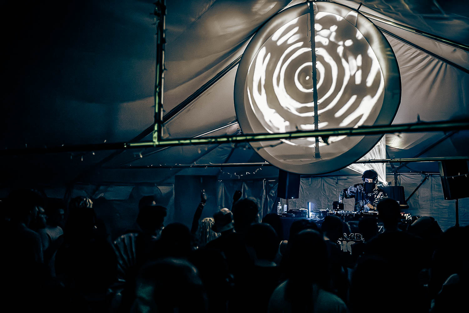 black label radio — the tent floor under the projection