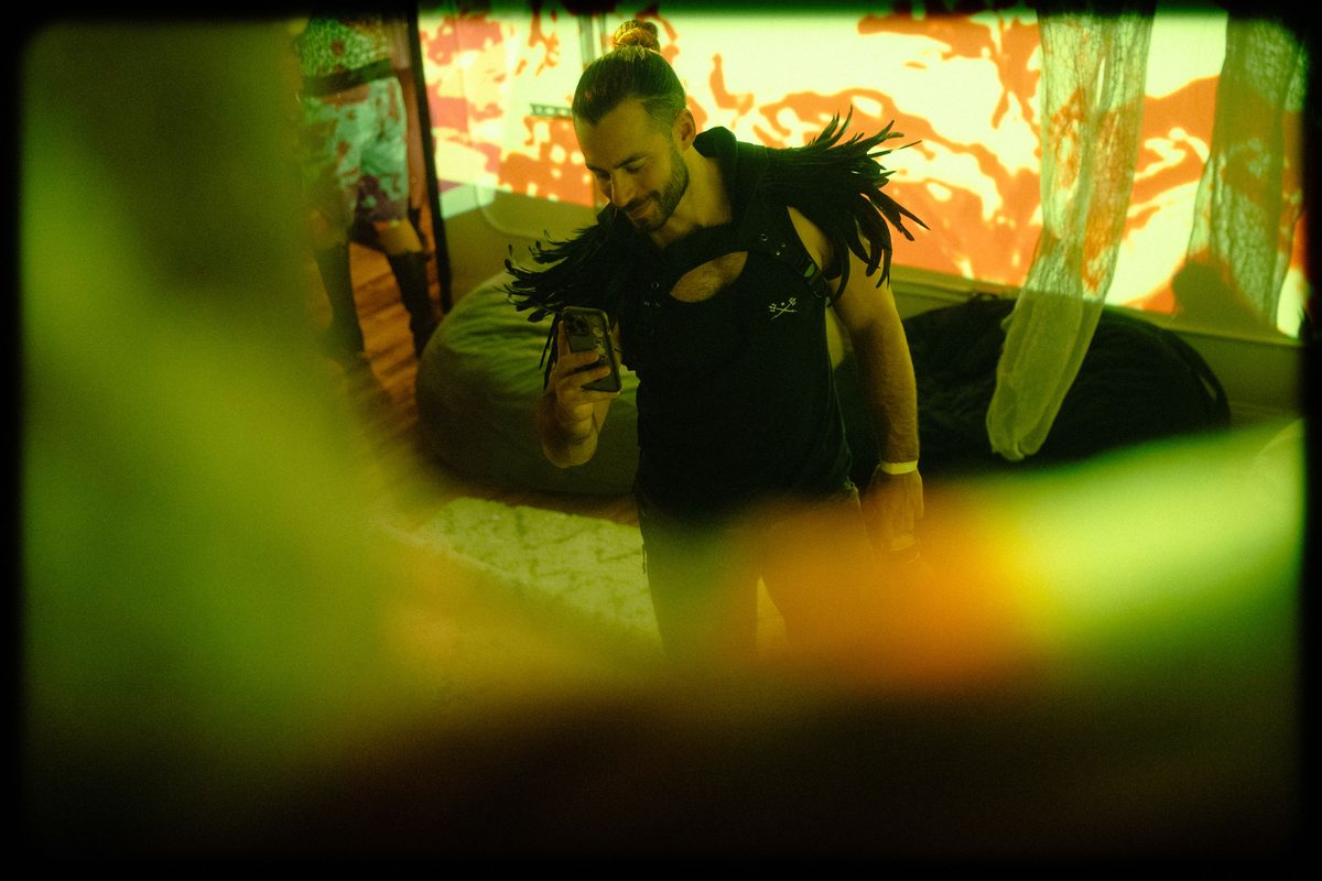 Max Lagardi backstage, seen through the gap in the drape